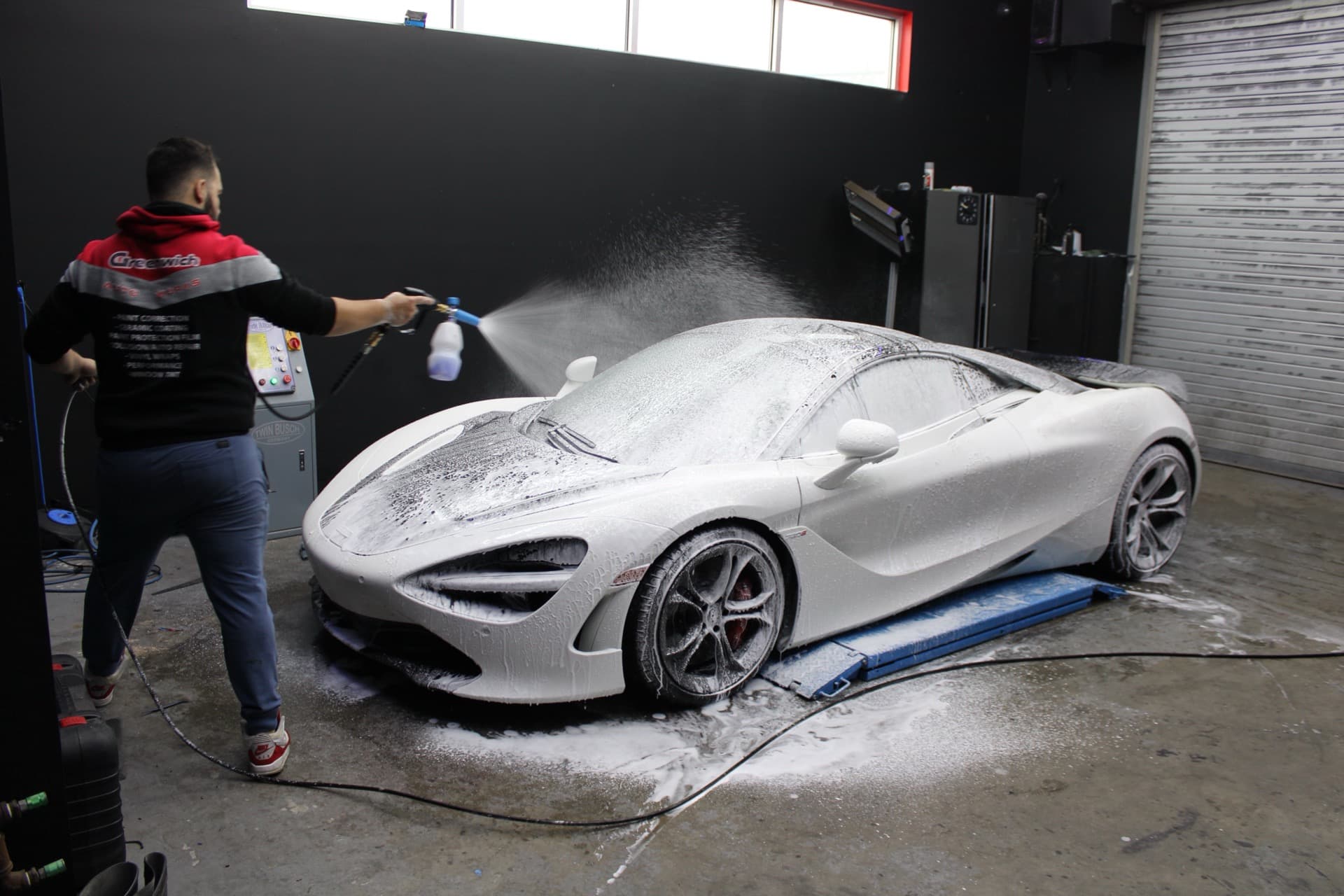 McLaren 720S foam wash with Ceramic Pro technician