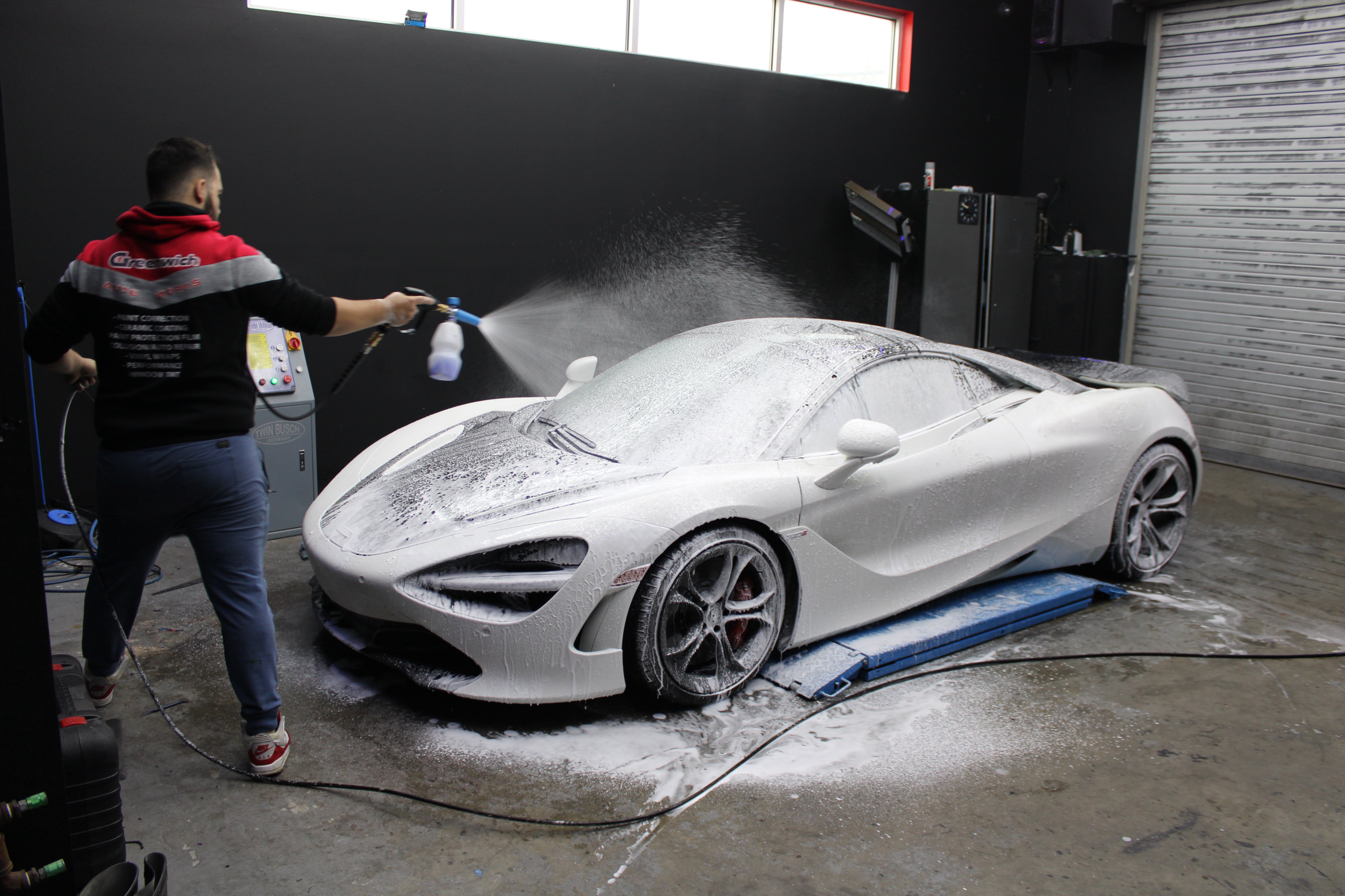McLaren 720S foam wash with Ceramic Pro technician